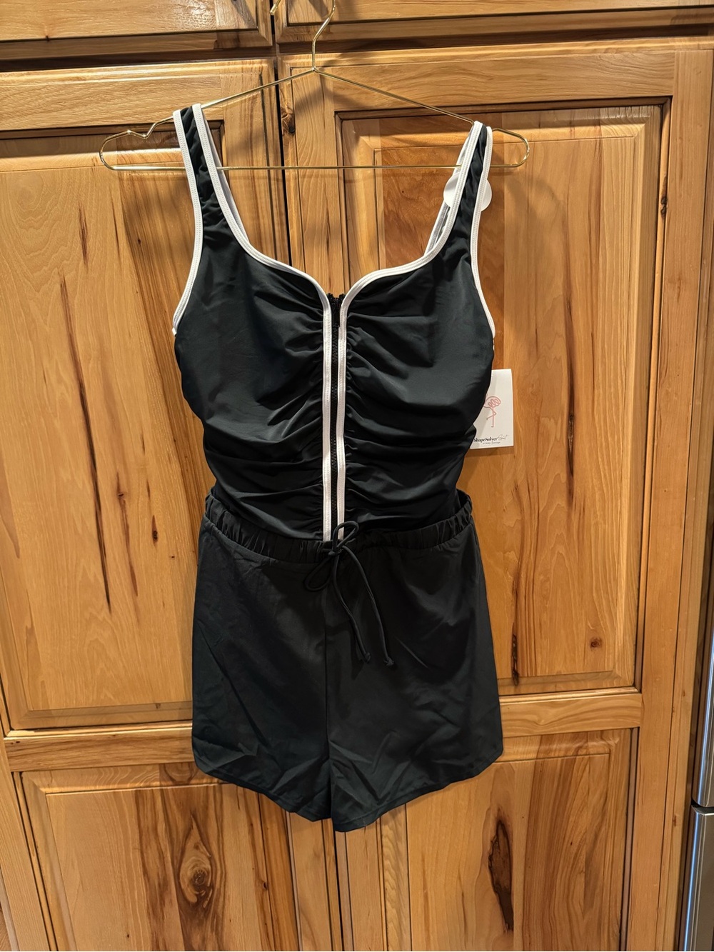 Black One-Piece Swim Romper with White Trim